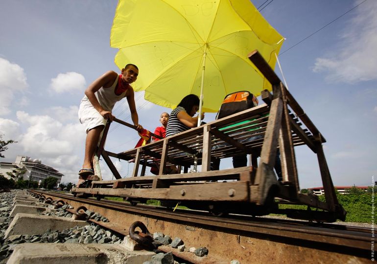 Филиппинские железнодорожные рикши (5 фото) 